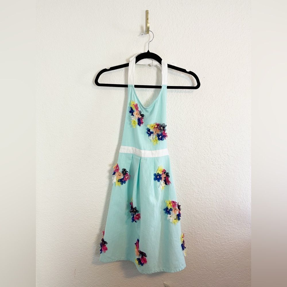 Anthropology retro inspired apron in robin’s egg blue with 3D flowers. NWT